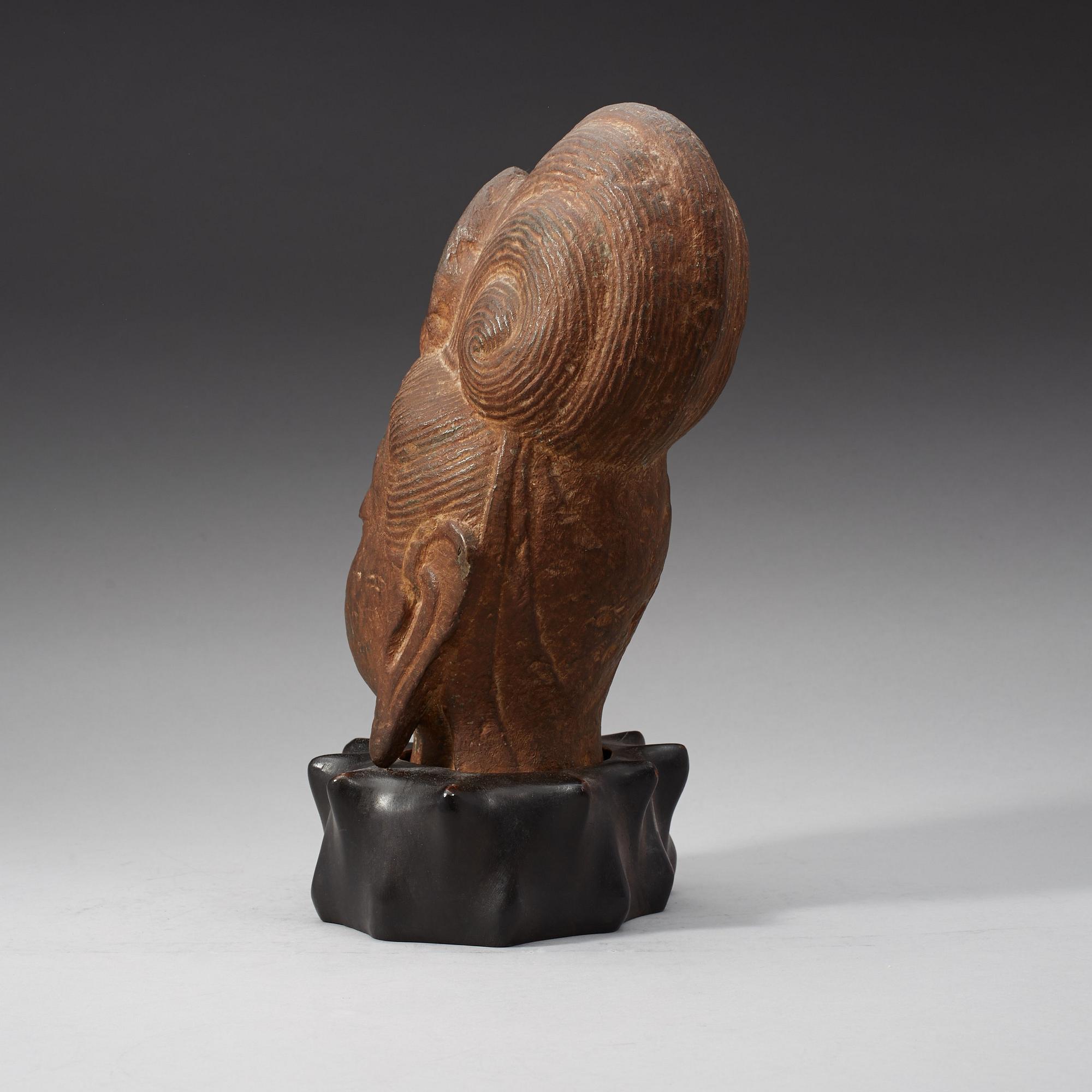 A Chinese stone head of Guanyin, possibly Tangdynasty.