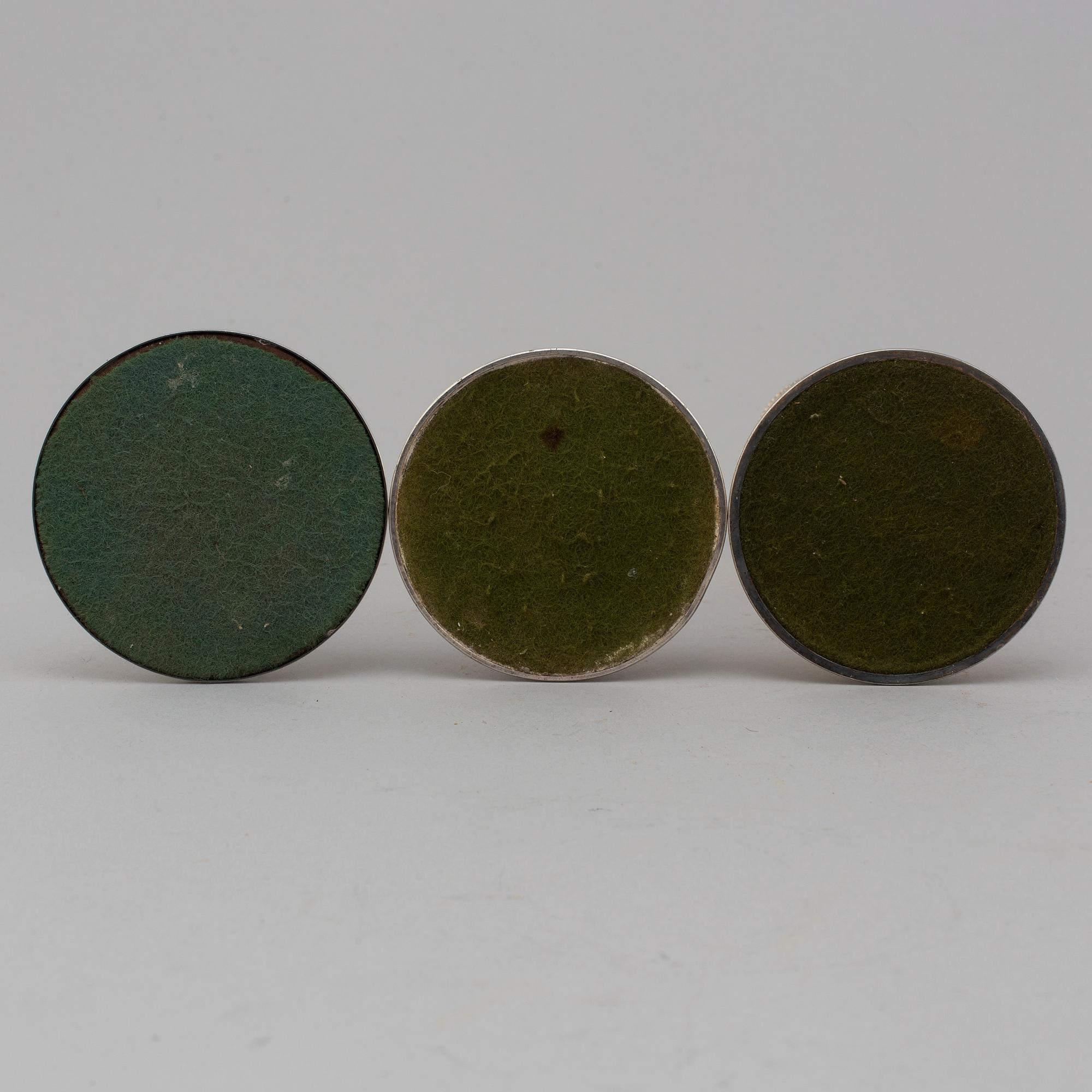 Three Finnish silver candlesticks, 1989-97.