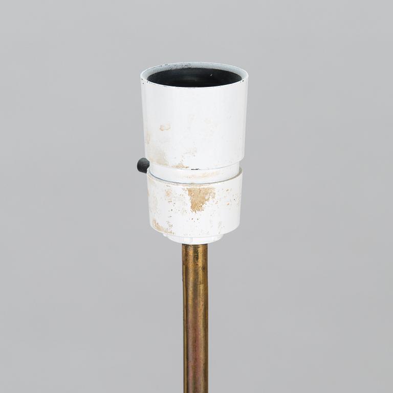 A mid-20th-century three-light floor lamp.