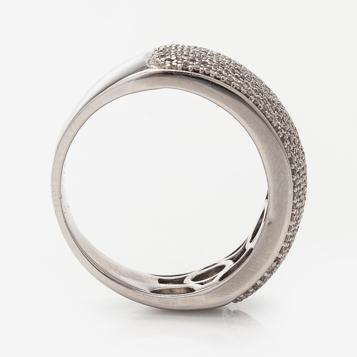 Sormus, 14K valkokultaa ja 8/8-hiottuja timantteja.