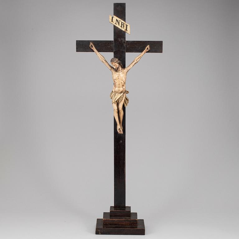 A painted wood crucifix, 18th/19th century.