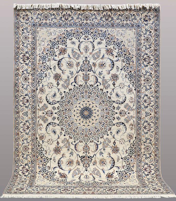 A CARPET, Nain part silk, s.k 9LAA, ca  303 x 202 cm.