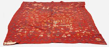 An embroided wool bed cover of 'fall of man' design, South west Scania, Sweden, first half of the 19th century.