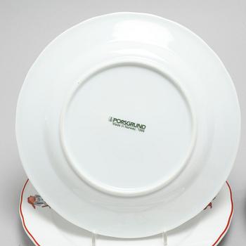 A 1990s christmas porcelain tableware set of 8 pcs, "Nisse" by Porsgrunds Porselænsfabrik, Norway.