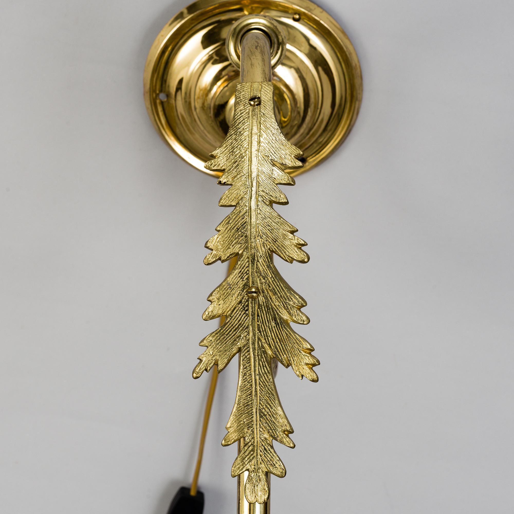 Three mid 20th century brass wallscones.
