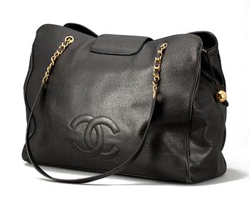 A 1990s black "caviar" leather bag by Chanel.