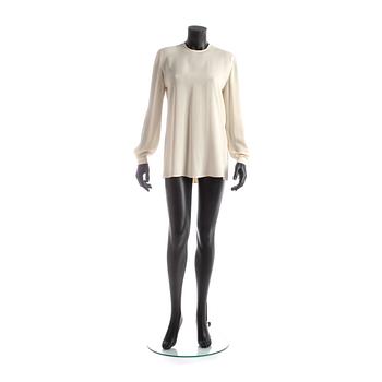 750. GIORGIO ARMANI, a light beige silk blouse.