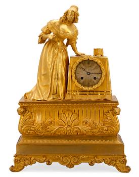 A MANTEL CLOCK.