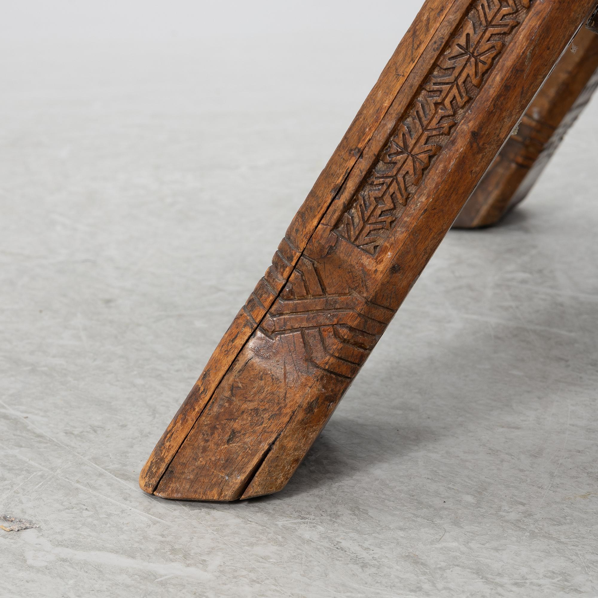 Armchair, after a design by Vasily Shutov called 'Arc, Axes and Mittens' Russia late 19th century.