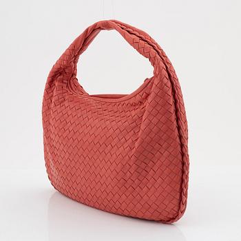 Bottega Veneta, a intrecciato leather bag.