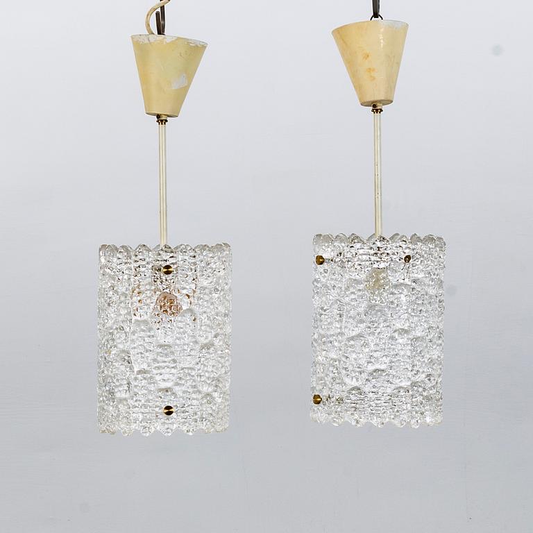 CARL FAGERLUND a pair of lamp pendants, Orrefors, second half of the 20th century.