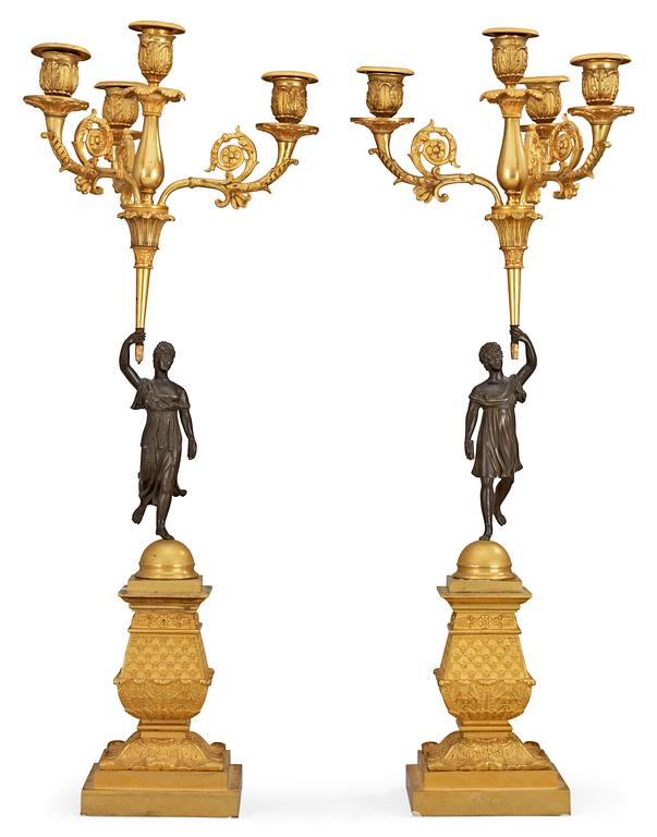 A pair of French late Empire four-light candelabra.