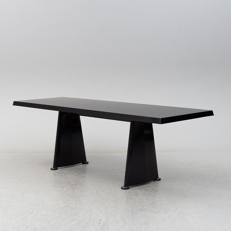 A 'Trapeze' dinner table by Jean Prouvé, Vitra, 2002.