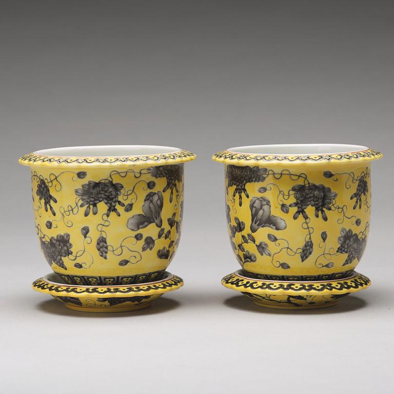 A pair of yellow glazed Dayazhai mark flower pots with stands, Republic, 20th Century.