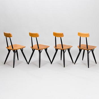 ILMARI TAPIOVAARA, A "Pirkka" table and four chairs manufactured by Laukaan Puu and designed in 1957.