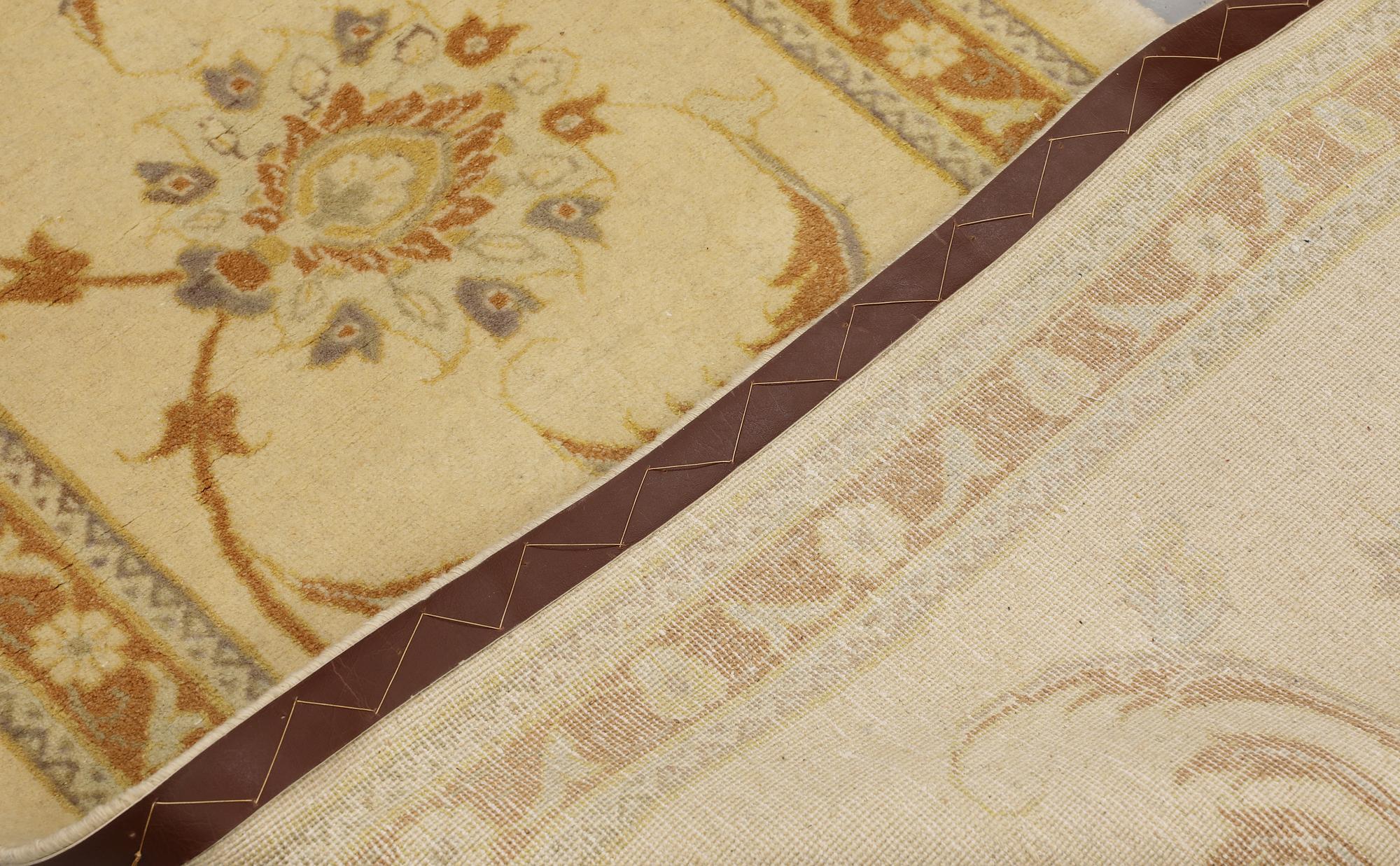 A runner, Ziegler design, c. 398 x 81 cm.