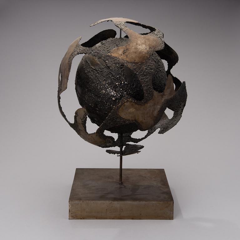 A bronze sculpture signed and dated 1969.