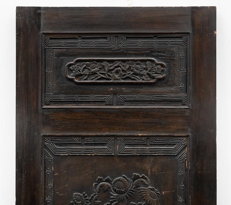 A Chinese wooden panel, Qing dynasty, 19th century.