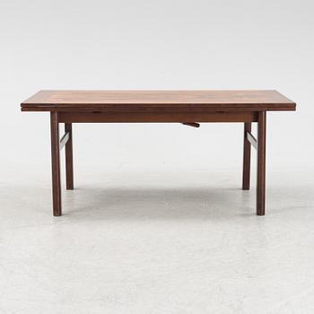 A convertable rosewood dining table/coffee table, 1960's/70's.