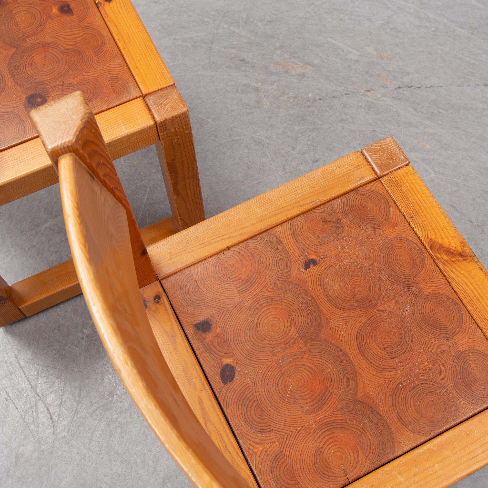 A set of six mid 20th century pine wood chairs with wheels.
