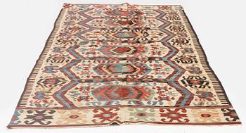 An antique central Anatolian kilim, possibly Konya, c. 339 x 140 cm.