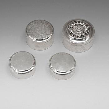 112. Four round 19th century silver boxes, different makers.