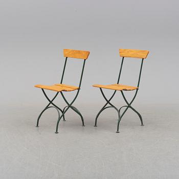 A pair of mid 20th century garden chairs.