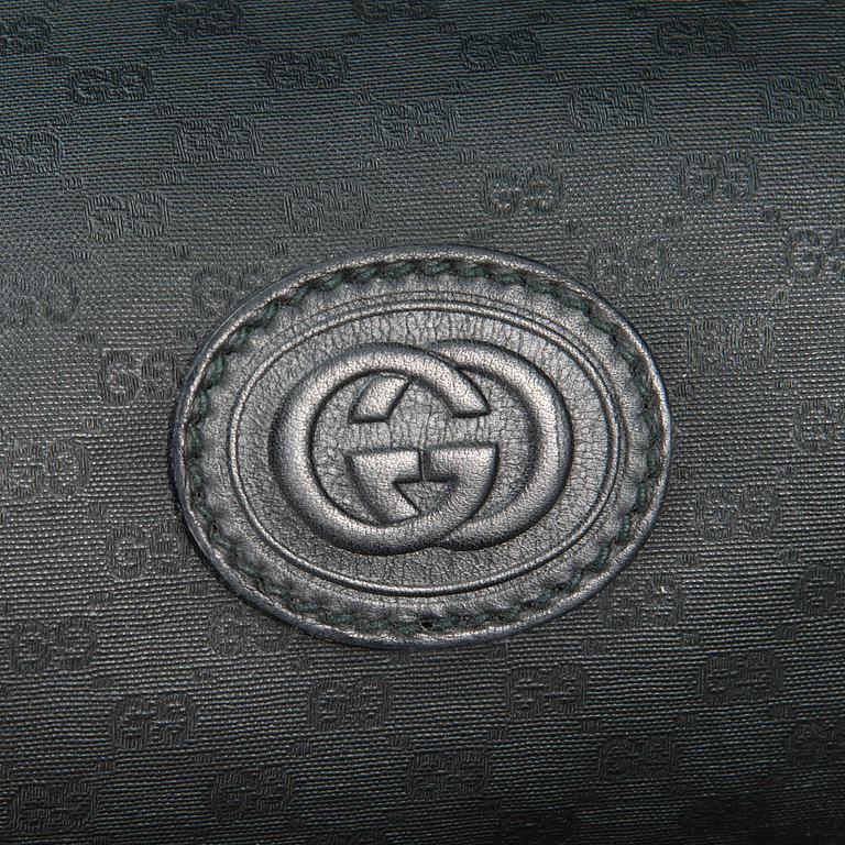 GUCCI, KLÄDÖVERDRAG SAMT VÄSKA, 1980-tal.