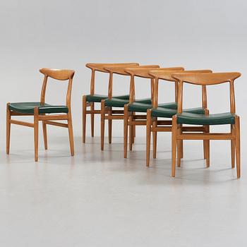 Hans J. Wegner, a set of six oak chairs, CM Madsen Fabriker, Denmark.