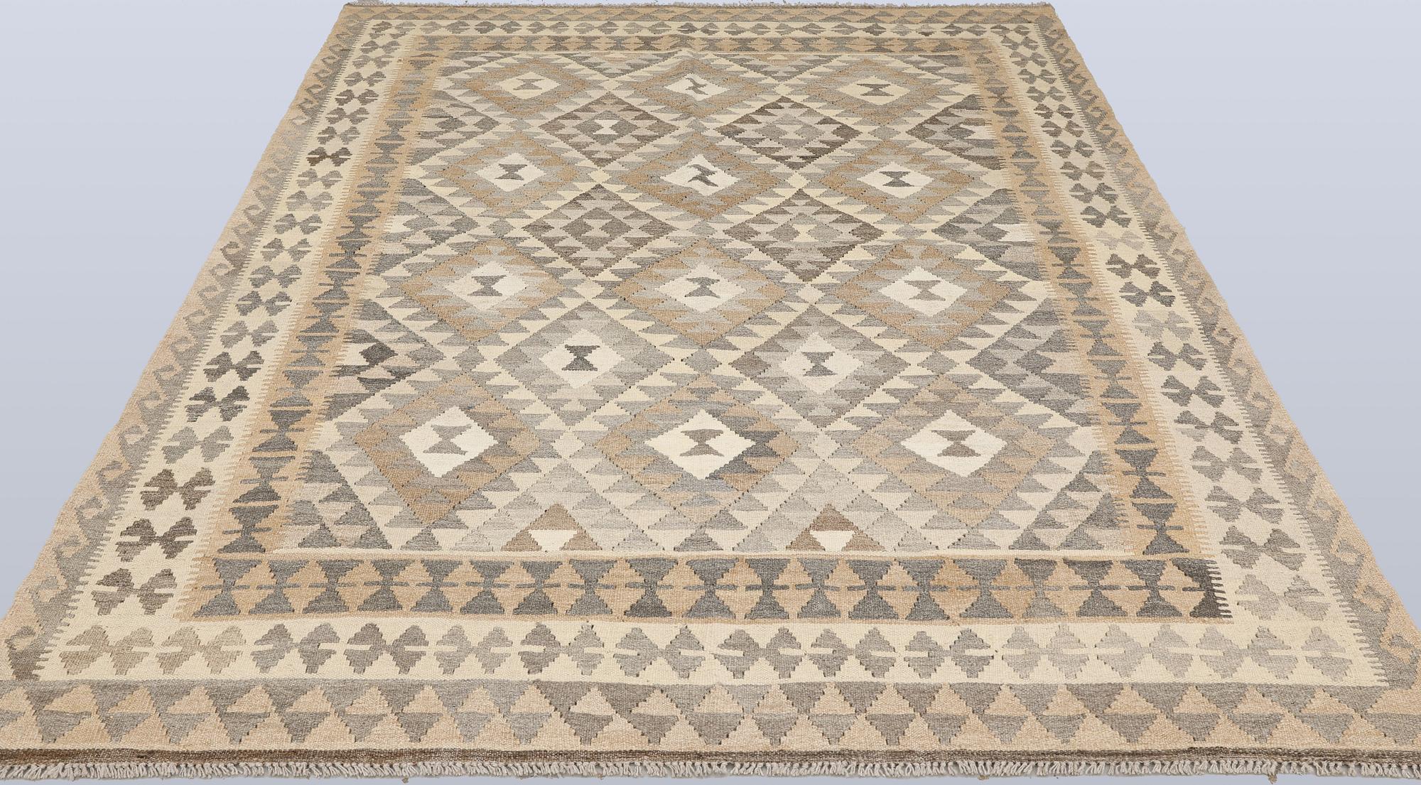 A Kilim rug, approx. 296 x 183 cm.