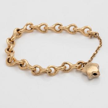Armband 18K guld med en diamant.