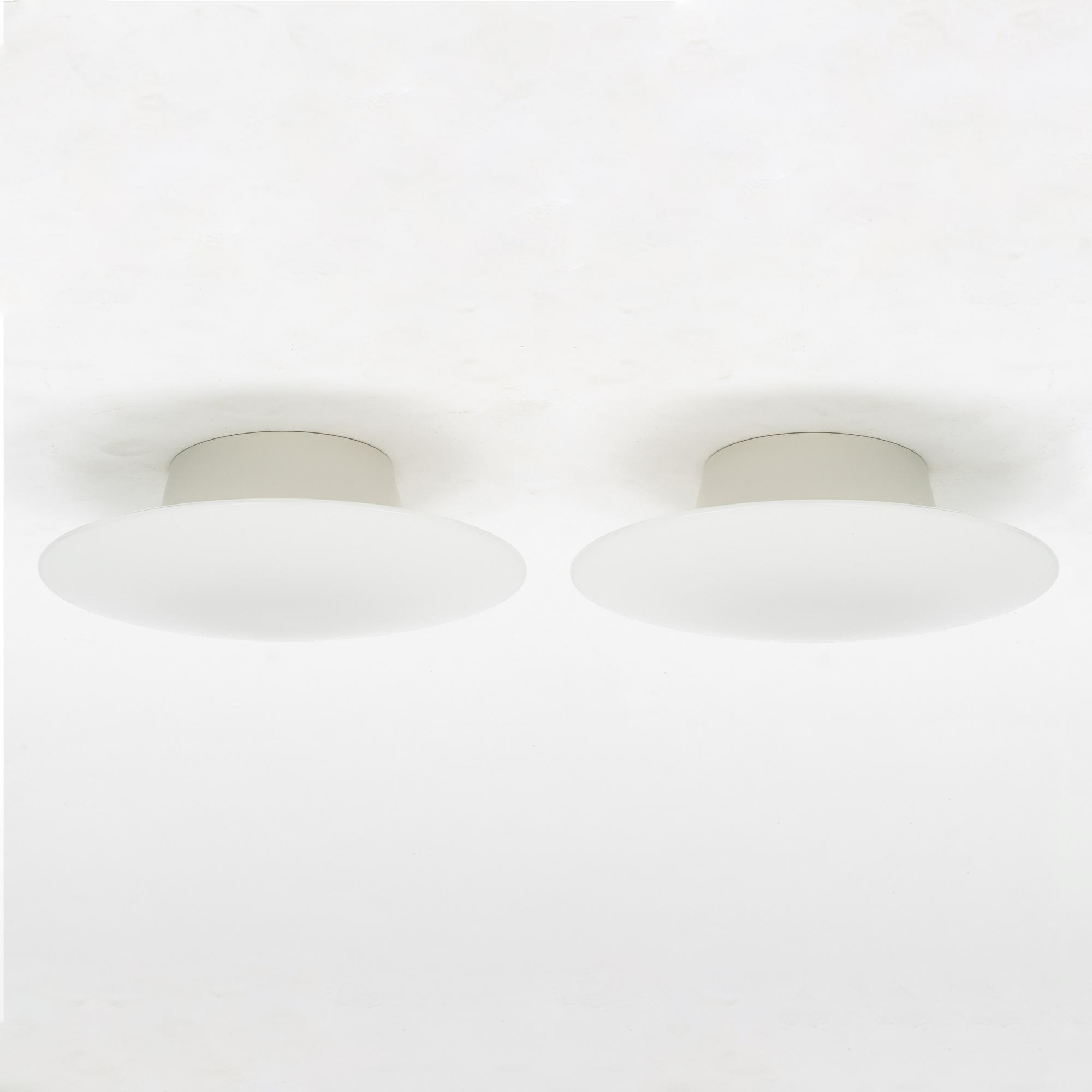 Arne Jacobsen, a pair of 'AJ-Eklipta' ceiling lamps / wall lamps, Louis Poulsen, Denmark.