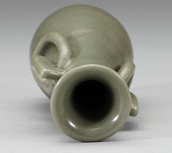 A pear shaped celdon glazed vase, Ming dynasty.