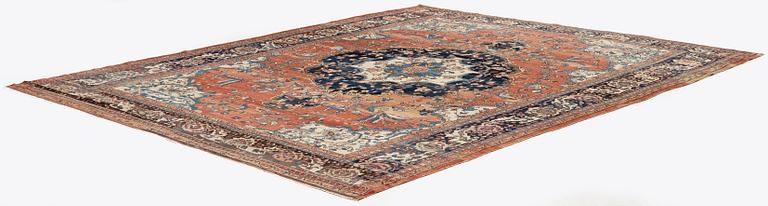 An Antique Sarouk carpet, West Persia, c. 353 x 260 cm.