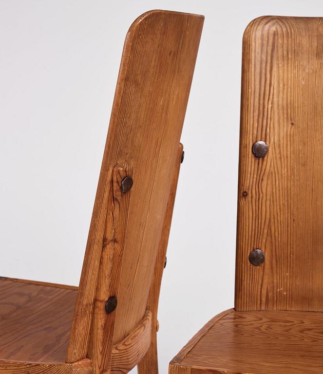 Axel Einar Hjorth, a set of four "Lovö" stained pine chairs, Nordiska Kompaniet 1930s.