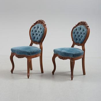 Six late 19th century walnut chairs.