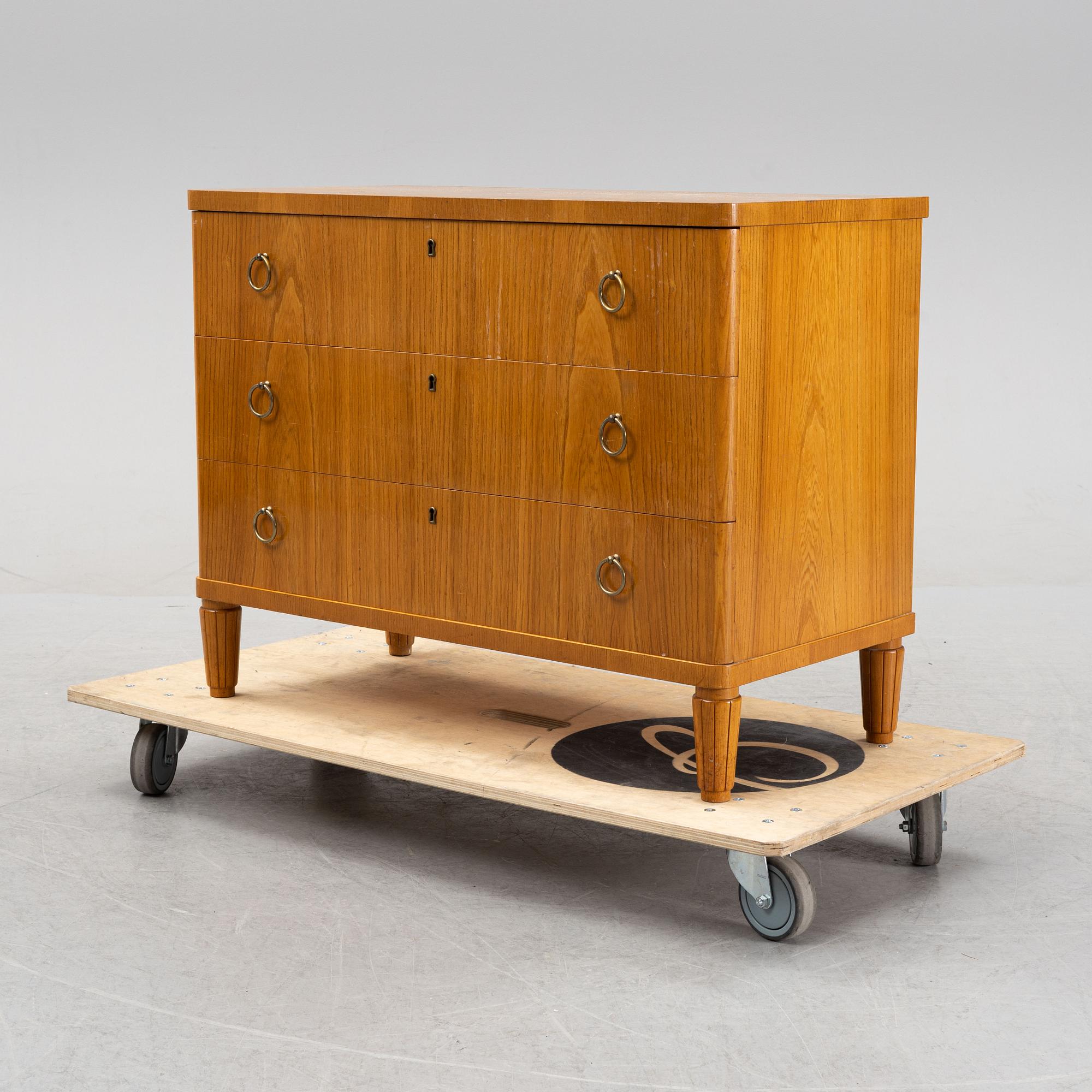 An elm wood veneered dresser, mid 20th Century.