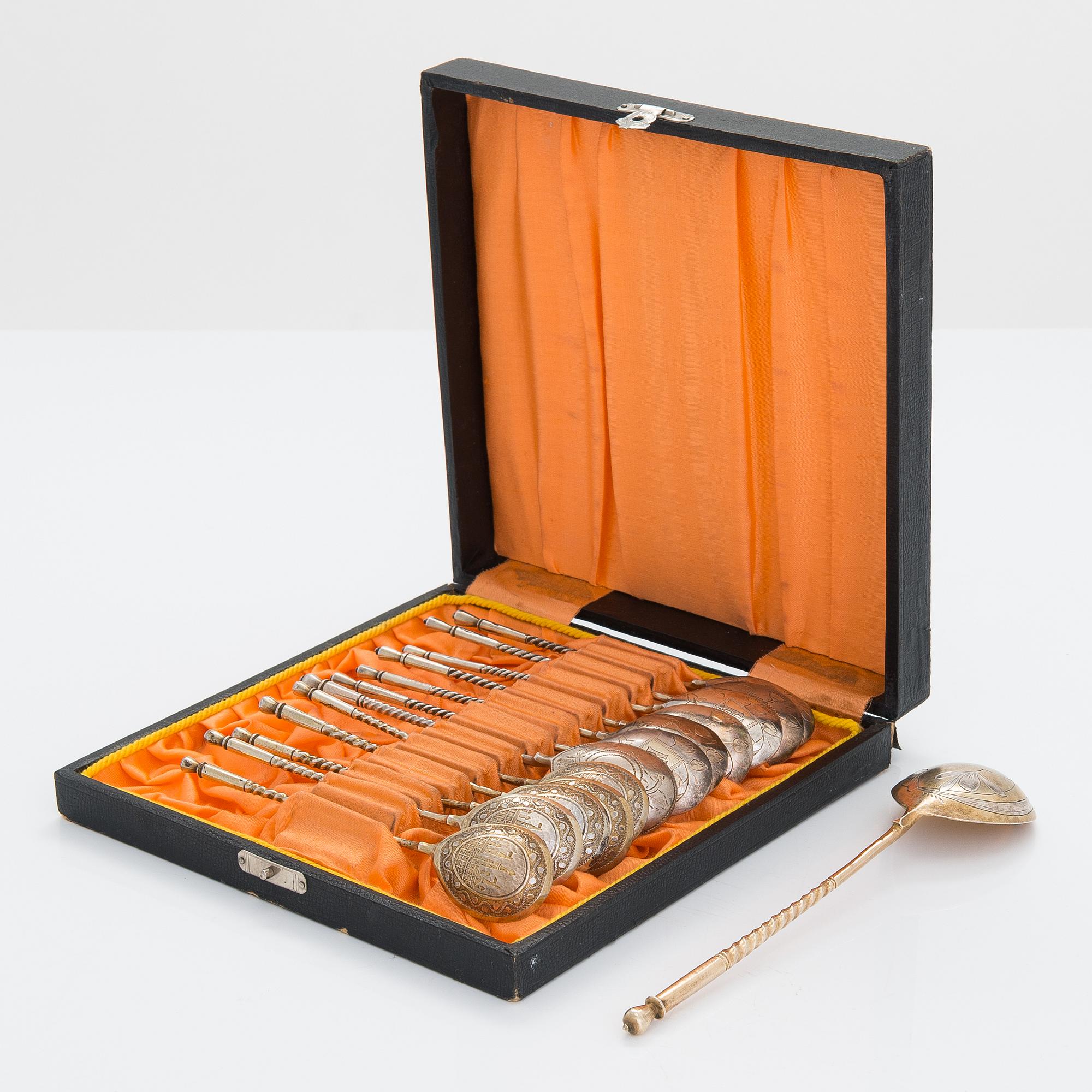Twelve parcel-gilt teaspoons and a jam spoon, Russia 1887-1926.