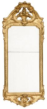 913. A Swedish Rococo mirror.