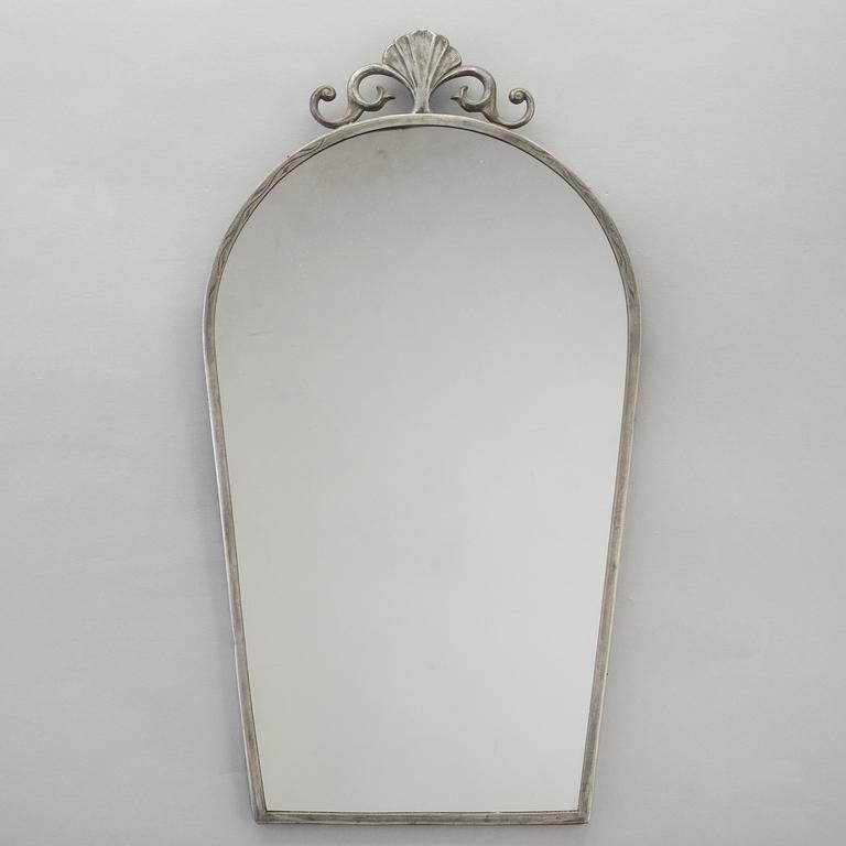 A Swedish mirror and a pair of wall sconces, 1920s / 30s.