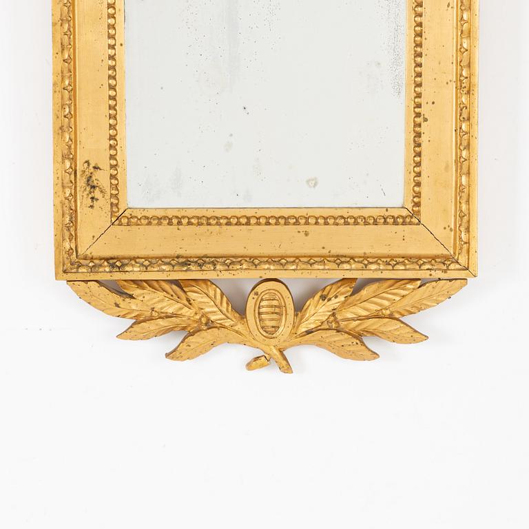 A Gustavian style mirror, first half of the 20th Century.