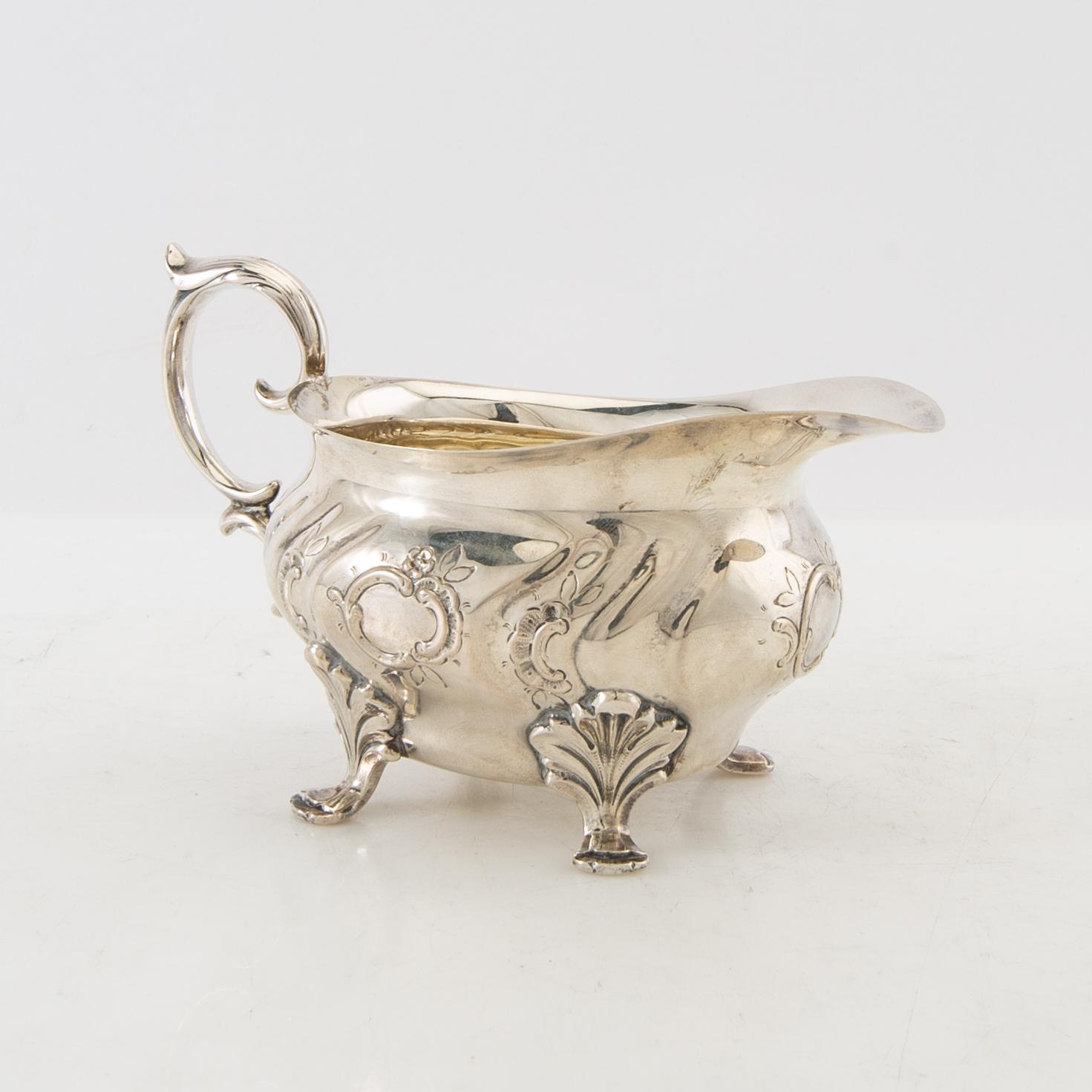 Cream jug Rococo style CG Hallberg Stockholm 1951 silver.