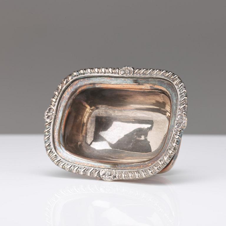 A pair of 20th century coasters, white metal and an English silver plated salt-cellar and A 20th c glass table-bell.