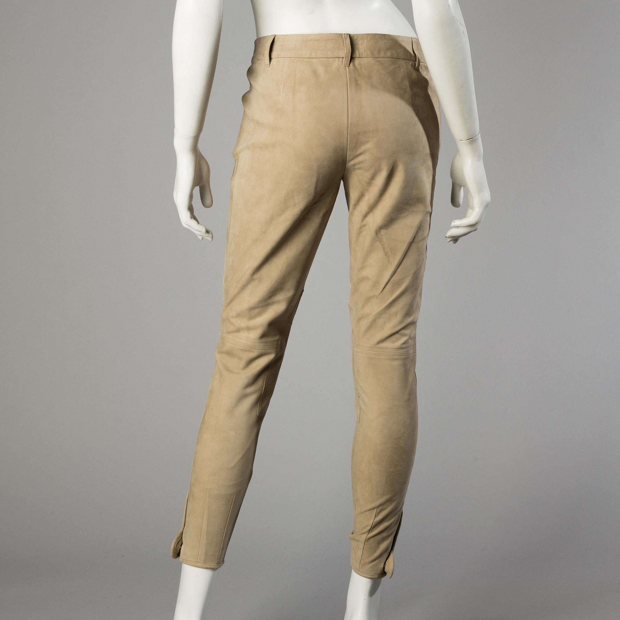 A beige suede pants by Ralph Lauren.