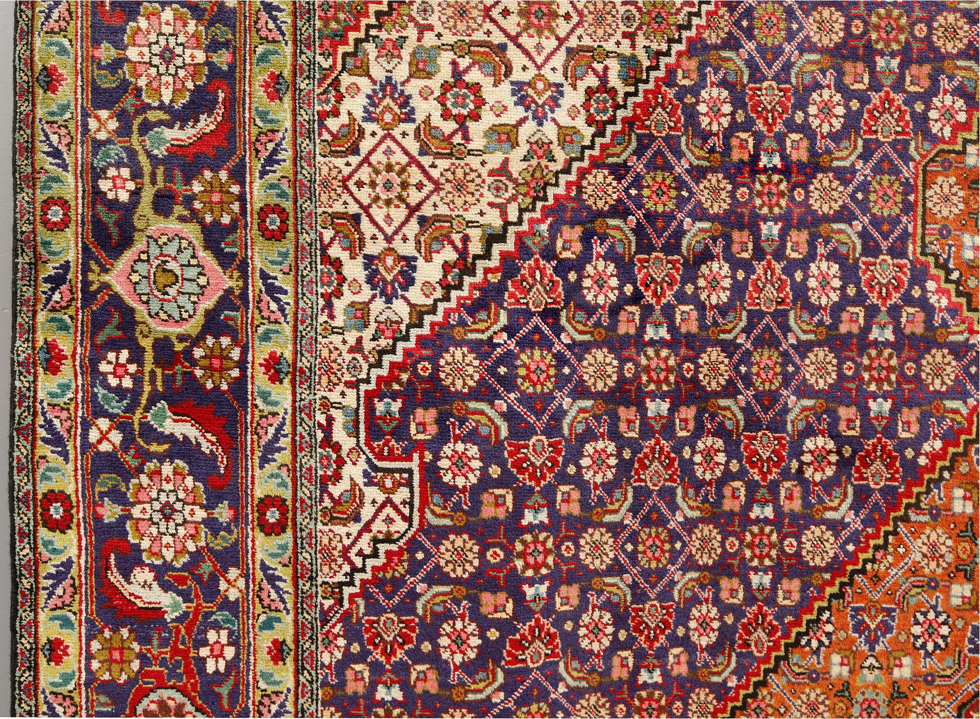 A Tabriz carpet, approximately 360 x 255 cm.