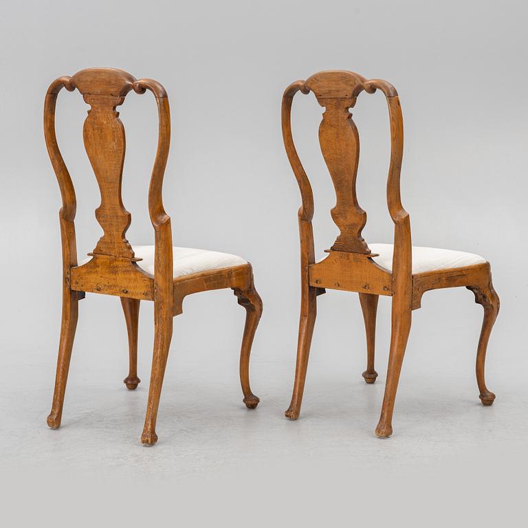 A pair of Swedish late baroque chairs, mid 18th century.