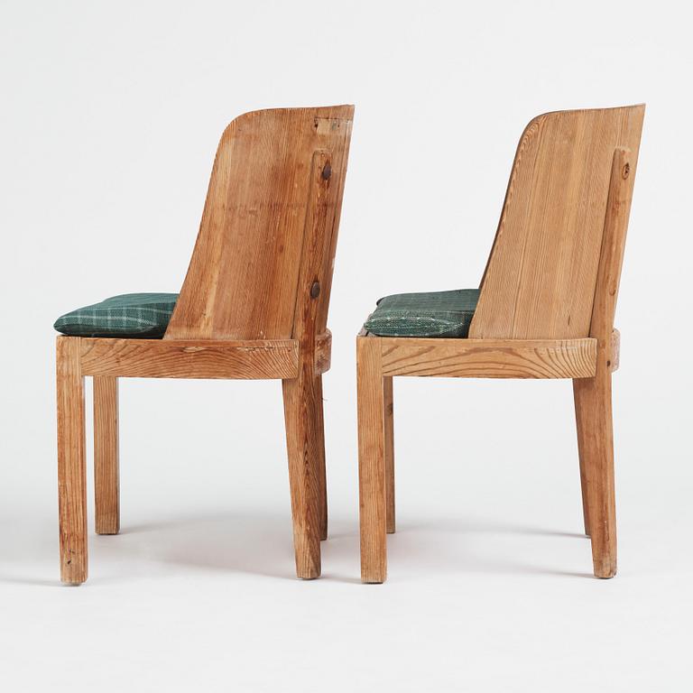 Axel Einar Hjorth, a pair of "Lovö" stained pine chairs, Nordiska Kompaniet, 1930s.