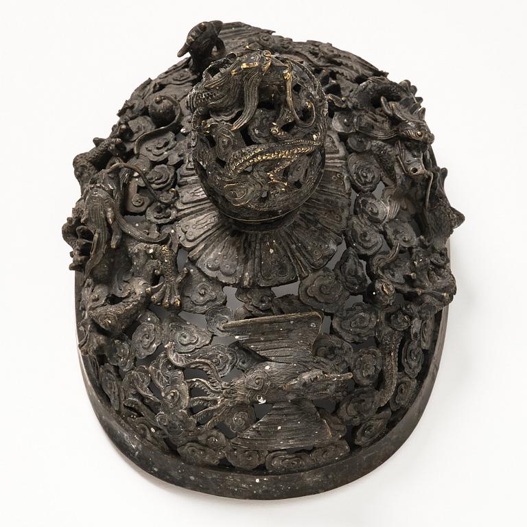 A bronze reticulated incense burner with cover, Qing dynasty (1644-1912).