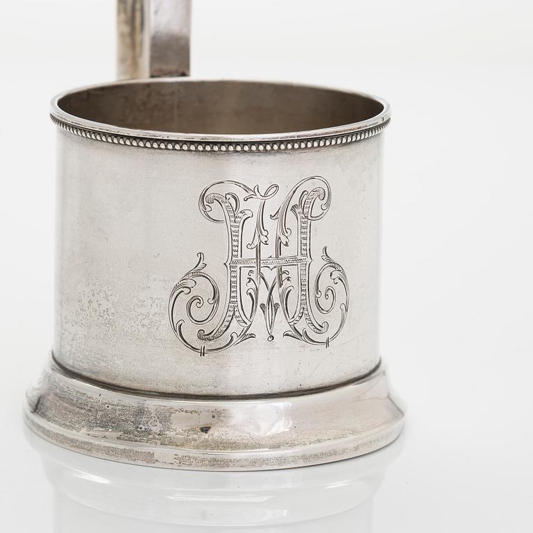 A Morozov silver tea glass holder, stamped with purveyor to the court mark, St. Petersburg 1898-1903.