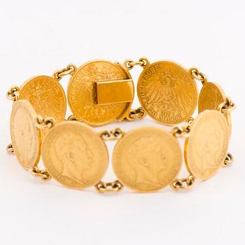 ARMBAND, guldmynt, infattning 18K guld.